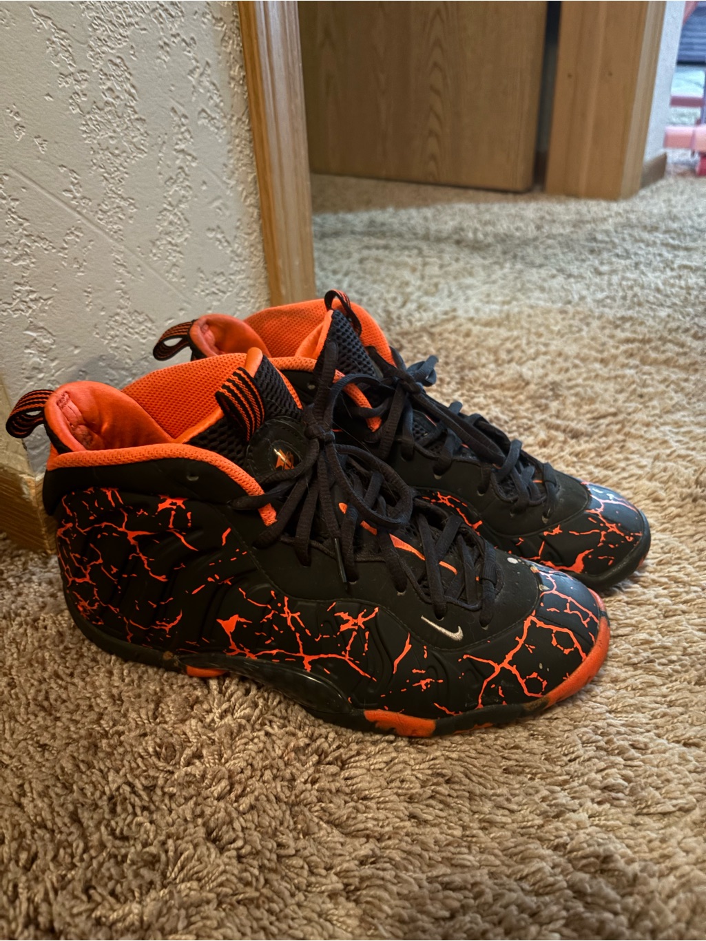 Nike Kids Black Sneakers With Orange Marble Accents